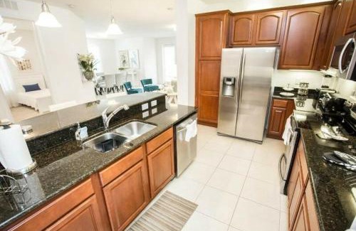 Florida Central Atlantic Coast House | Modern Vacation Apartment with a Lake View at Vista Cay Resort VC4816