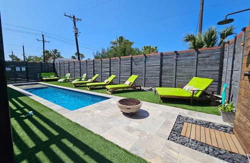 South Padre Island Villa | Modern Villa with spacious living area. Private backyard.