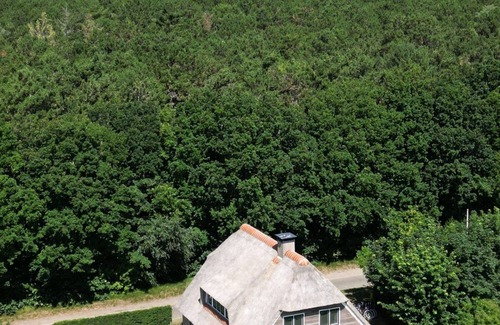 Hollum House | Modern villa with jacuzzi. Village Hollum, forest and beach on walking distance.