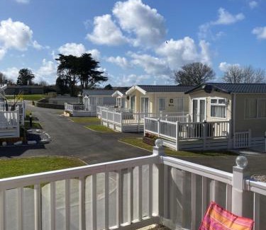 Newquay House | Mollys Retreat pet friendly three bed caravan with small garden Newquay Bay Resort Quieter area of park