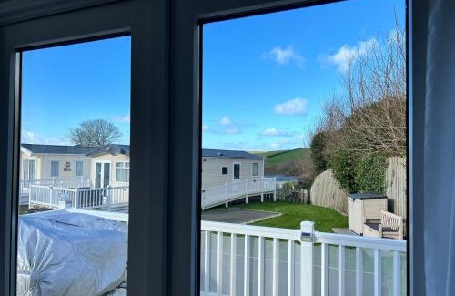 Newquay House | Mollys Retreat pet friendly three bed caravan with small garden Newquay Bay Resort Quieter area of park