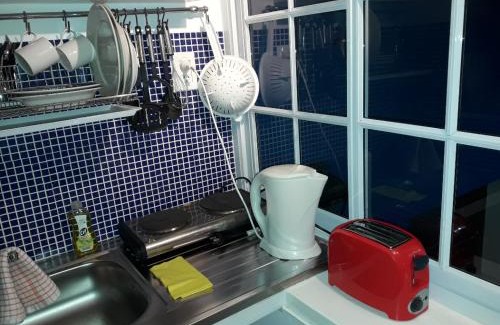 Abasto House | Monoambiente con baño privado y cocineta dentro de casa