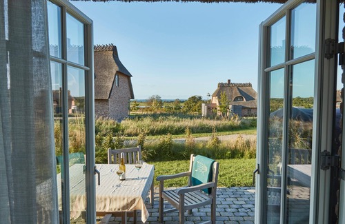Nieby House | Morgentau, das Atelierhaus Unter Reet für bis zu 8 Personen, Direkter Seeblick