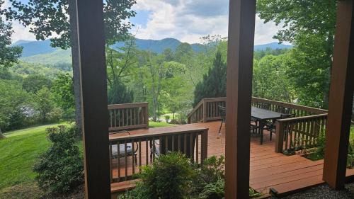 Sylva Apartment | Mountain View 2BR Log Cabin Apt wPrivate BBQ Deck