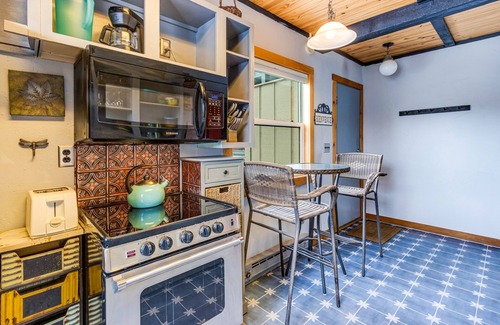 Wildernest Condo | Mountain-view condo in central location with wood stove