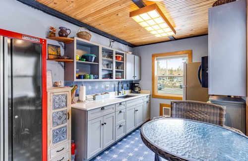 Wildernest Condo | Mountain-view condo in central location with wood stove