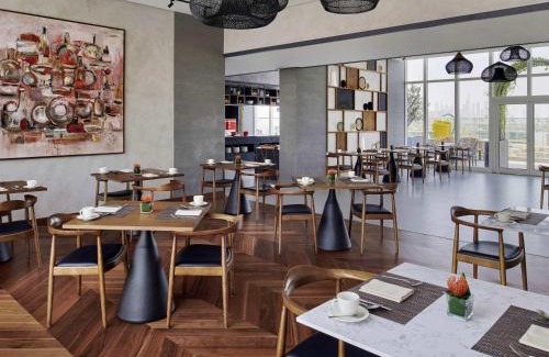 Jumeirah Village Triangle Hotel | Movenpick Jumeirah Village Triangle