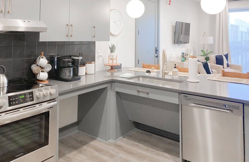 Rolling Mill Hill Condo | Muse | Contemporary condo in central location with rooftop lounge & central AC
