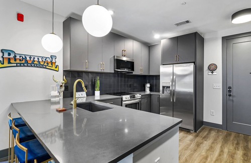 Rolling Mill Hill Condo | Muse | Rockstar downtown condo with private balcony, central AC & gym