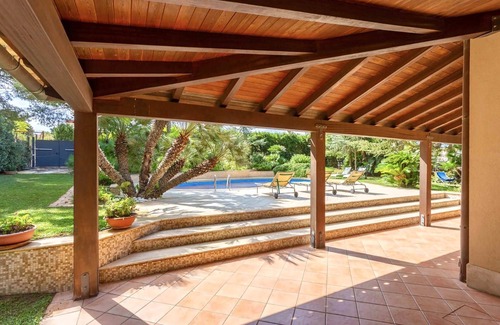 Valderice Villa | My Rental Homes - Villa Acquamarina with swimming pool surrounded by greenery