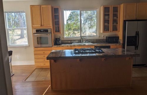Valley Springs House | Natural clay tennis court 80 acres near Hogan lake.