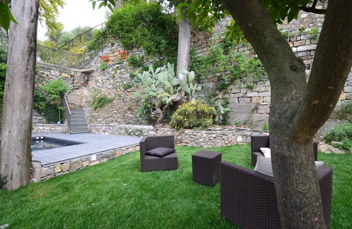 Praelo House | Natural stone house in panoramic position with pool and garden.