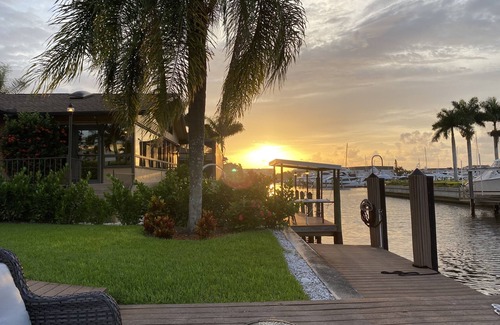 Royal Harbor House | Near Downtown Naples Canal front with 16,000 Lb boat lift, heated pool. Sleeps10