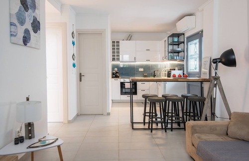 Exarhia Apartment | Neoclassical house with garden in the center of Athens.