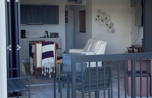 Fitts Village Apartment | Nestled in the heart of Fitts Village, Zinnia becons with the promise of a costa