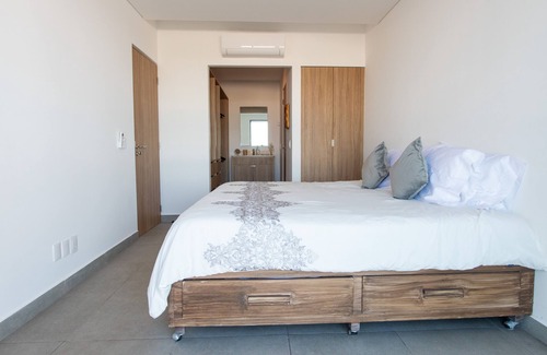 Zona Industrial Condo | New 2BR Condo in front of the US Consulate