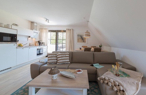 Zingst Apartment | New, bright and friendly beach vacation apartment for up to 6 people with sauna house.