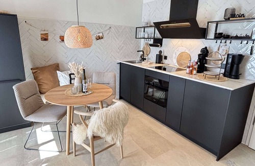 Rysum Apartment | New-build vacation apartment with terrace, high-quality furnishings and proximity to the North Sea