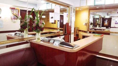Tsim Sha Tsui House | New Day Night Hostel RECEPTION 24 HOUR BLOCK D CHUNGKING MANSION TSIM SHA TSUI KOWLOONN