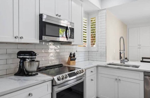 Hunt Club House | New Home at PGA National on Golf Course with Private Spa by Guaranteed Rental™