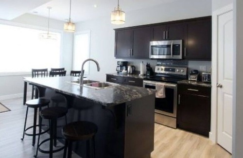 East Kootenay House | New Home on Golf Course now with an EV plug in