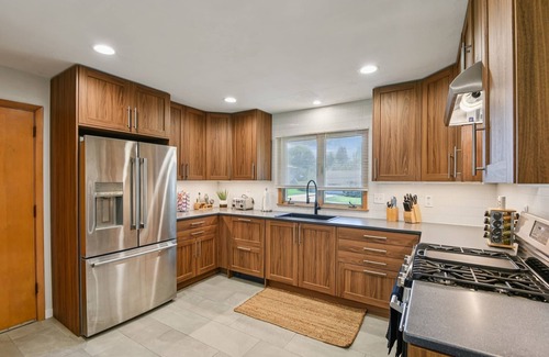 University Heights House | NEW! Iowa City 4BR Backyard Walk to Stadium