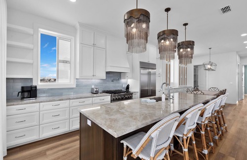 South Padre Island House | New luxury Bayfront home within the exclusive Shores Subdivision! Overlooking the Laguna Madre.