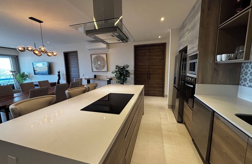 Cabo San Lucas Condo | NEW Luxury Condo in Cabo w/pool access & firetable. 5 minutes from downtown