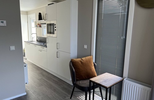 Lathum House | New, modern vacation home in the vacation park by the lake
