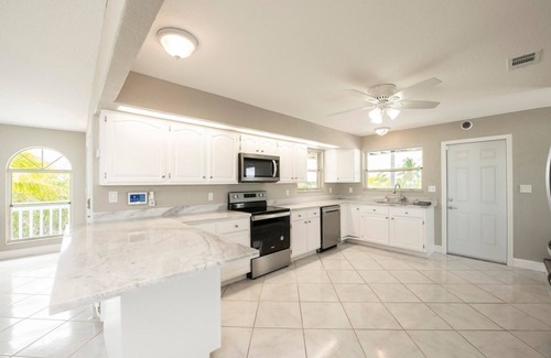 Little Torch Key House | New pool & Huge master suite! Open water views , 2 stories of wrap around decks