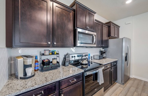 Four Corners House | NEW Windsor Cay Resort DREAM home w/pool & Movie Theater next to Disney!