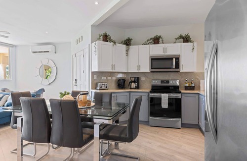 Potrero Condo | Newly Renovated Beachfront Condo with Inviting Minimalist Design, Pool & Balcony
