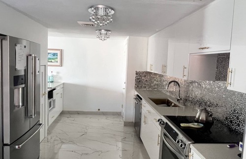 West Bay Villa | NEWLY RENOVATED! beach/ocean views, 2 BR, 2BA, quiet, gorgeous beach.