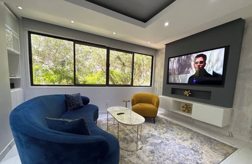 Santurce Apartment | Newly renovated, beautiful, modern, luxury 3BR/2BA in Condado. Steps from the beach, restaurants & shops. 5 min to Old San Juan & Isla Verde. Full kitchen, Wi-Fi, office, parking, washer/dryer & jacuzzi tub. Perfect for groups or family stays.