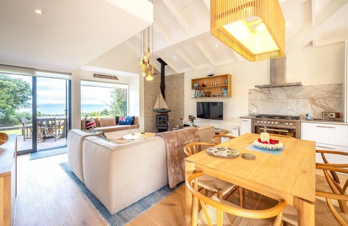 Surfdale House | Newly renovated waterfront home with good indoor living and leading to the beach