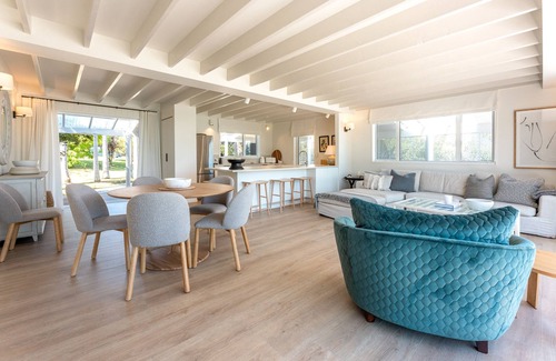 Surfdale House | Newly renovated waterfront home, with large flat lawn leading to the beach.