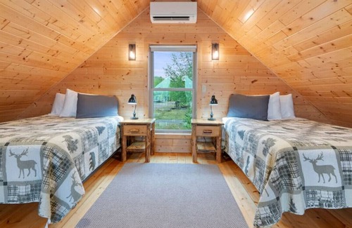 Houghton Cabin | Next to the snowmobile & recreation trails, on portage lake