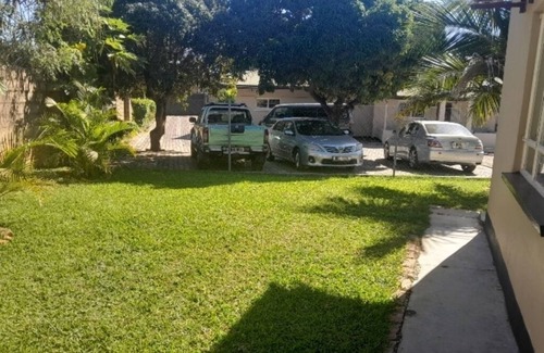 Lusaka Apartment | Nice 3-bedroom house with WiFi, AC spacious surroundings close to shops & Mall