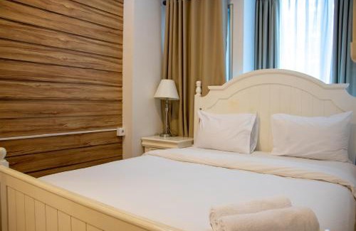 Menteng Apartment | Nice and Cozy 1BR with Extra Room Apartment at Capitol Park Residence By Travelio