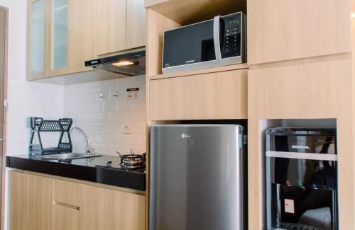 Ciputat Apartment | Nice and Fancy Studio at Transpark Bintaro Apartment By Travelio
