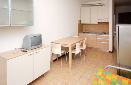 Lignano Sabbiadoro Apartment | Nice apartment for 4 guests with pool, A/C, TV, terrace and pets allowed