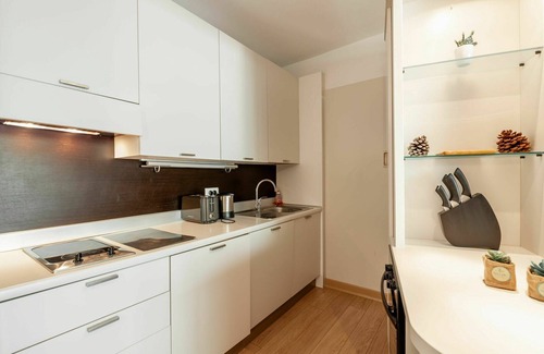 Santa Giulia Apartment | Nice apartment for 4 guests with A/C, pool, WIFI, TV and patio