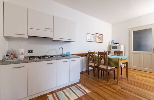 Vito d'Asio Apartment | Nice apartment for 4 guests with pool, WIFI, TV, patio and pets allowed