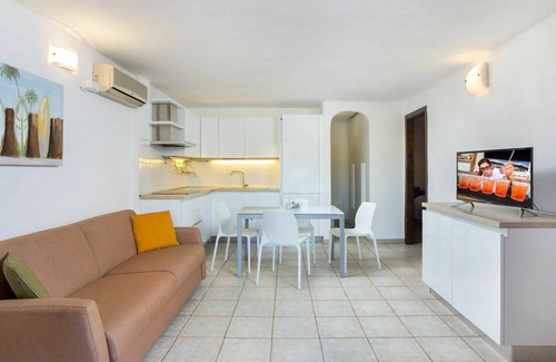 Liscia di Vacca Apartment | Nice apartment for 4 people with A/C, pool, WIFI, TV, terrace and parking