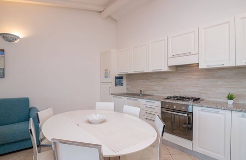 Porto Pozzo Apartment | Nice apartment for 6 guests with pool, WIFI, A/C, terrace and pets allowed
