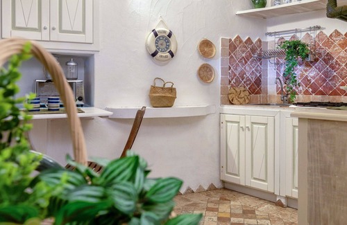 Capo d'Orso Apartment | Nice apartment for 2 people with A/C, TV and pets allowed