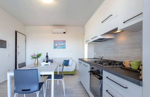 La Muddizza Apartment | Nice apartment for 5 people with A/C, TV, terrace, pets allowed and parking