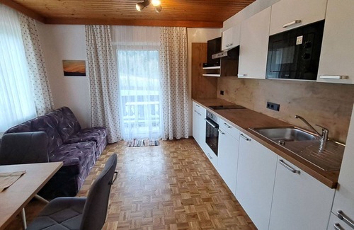 Oberwang Villa | Nice apartment in villa for 4 guests with WIFI, TV and balcony