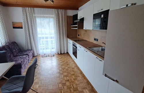 Oberwang Villa | Nice apartment in villa for 4 guests with WIFI, TV and balcony