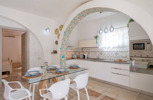 Eden Beach Villa | Nice apartment in villa for 11 guests with A/C, WIFI, pool, TV, patio and pets allowed